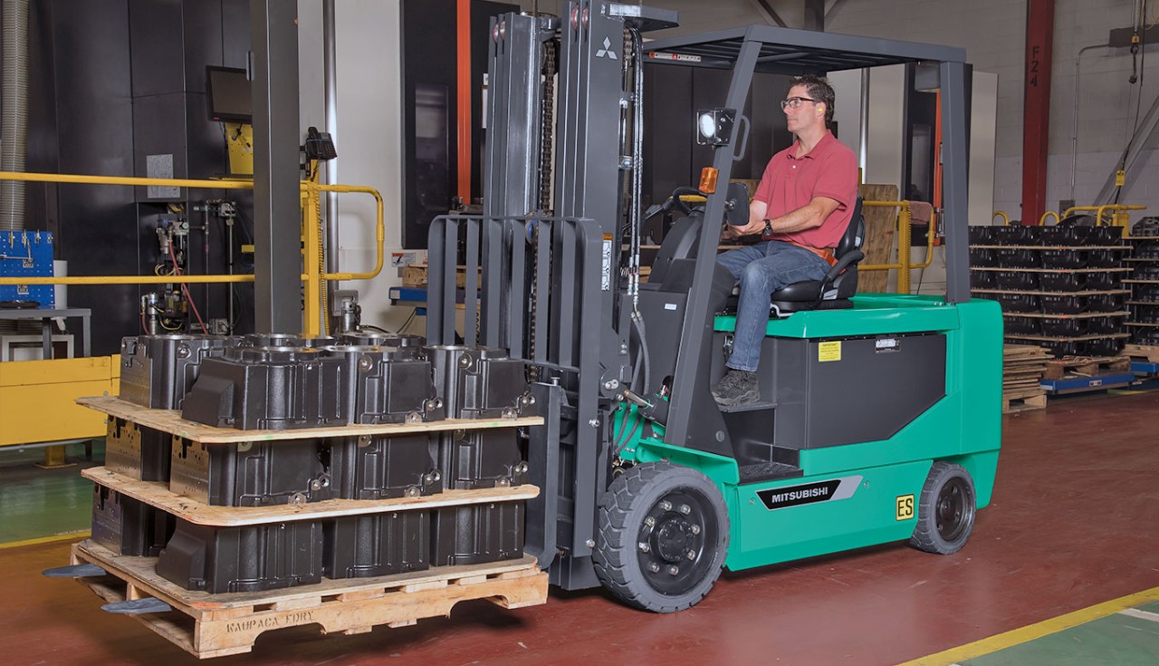 Mitsubishi forklift with equipment on pallets