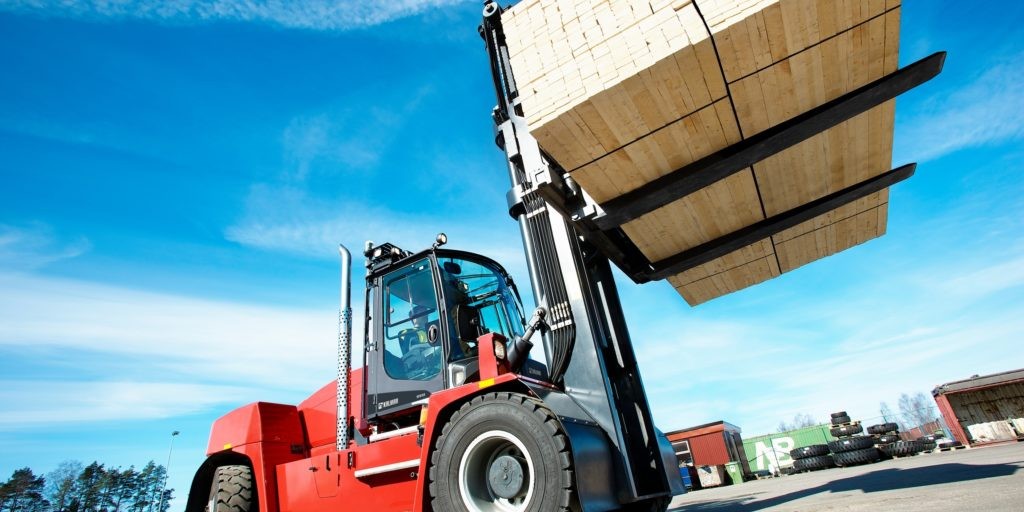 Kalmar forklift outside with a load of lumber