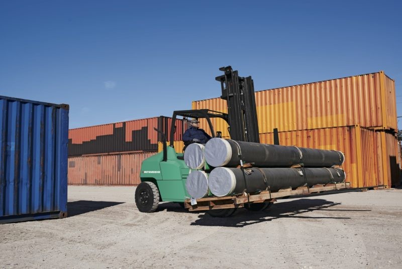 Mitsubishi forklift carrying long goods