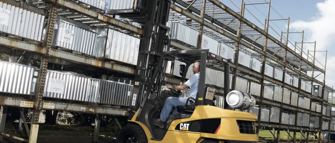 Man on a CAT forklift outside