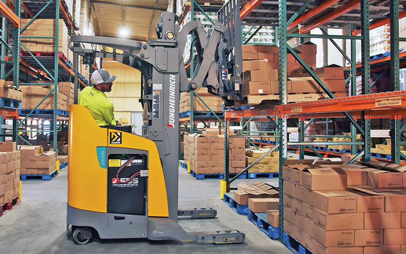 Jungheinrich narrow aisle forklift getting boxes from rack